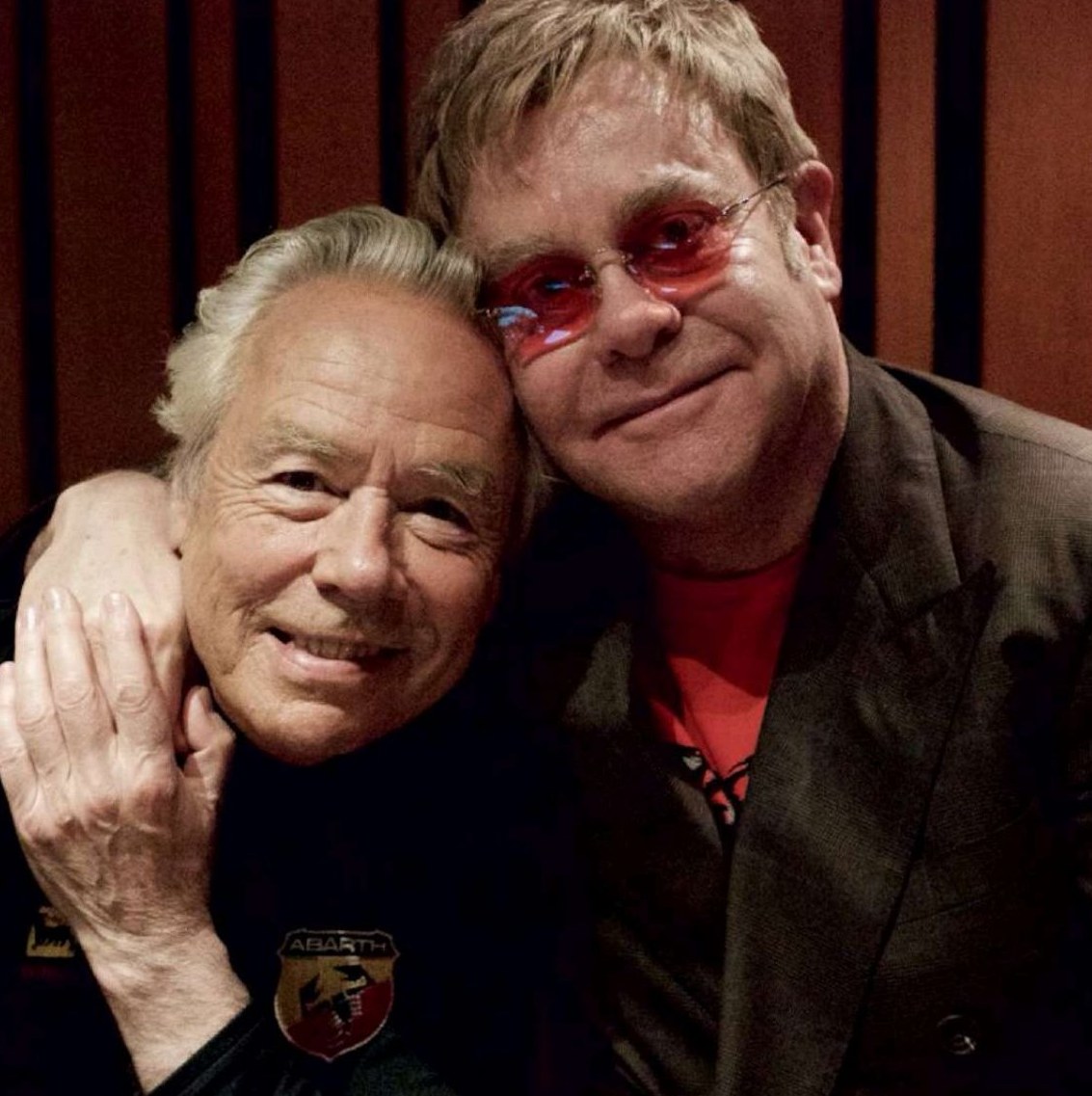 Nigel Olsson and Elton John together in the recording studio.